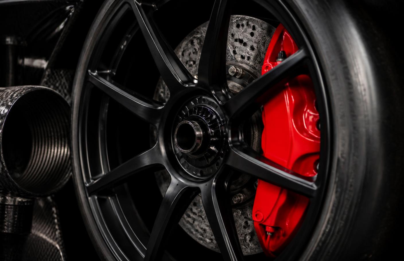 Carbon brake disc and caliper detail on a GT3 wheel assembly